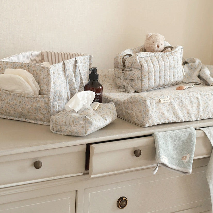 A collection of baby essentials in nature trail design