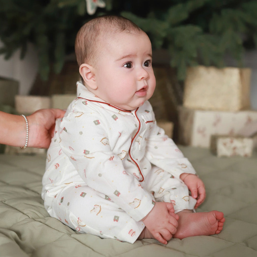 Baby in sleepsuit nutcracker