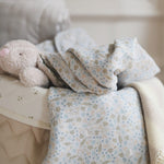 Muslin swaddles nature trail on storage basket